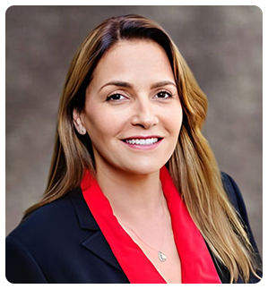 Nancy Kardon, Esq., a smiling woman in a black suit with a red top, standing next to text about Kardon Law and a faint statue of Lady Justice.